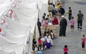 مئات السوريين يعودون من مخيمات تركيا