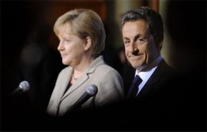 ميركل وساركوزي يعدان بتقديم حلول لأزمة ديون منطقة اليورو 