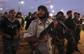 الحكومة الليبية تعد بنزع السلاح من طرابلس