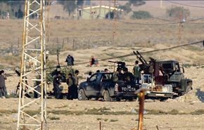 معارك بين مسلحين وأكراد بالحدود السورية -التركية