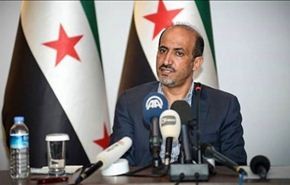 الجربا: المعارضة السورية تشارك في مؤتمر جنيف 2