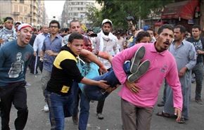 إصابة عدد من المتظاهرين ومصورنا في اشتباكات بمصر