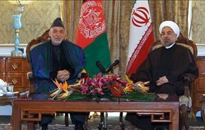 روحاني مستقبلا كرزاي: ايران ترفض أي تواجد اجنبي بالمنطقة
