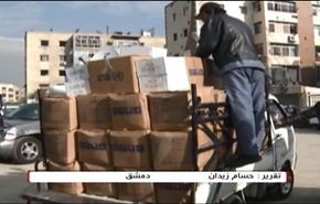 فيديو؛ مساعدات تصل مخيم اليرموك رغم قناصي جبهة النصرة