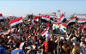 تظاهرات في محافظات سورية تأييدا للجيش والوفد الحكومي+فيديو