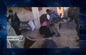داعش تعدم مواطنين سوريين بينهم طفل بدم بارد+فيديو