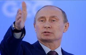بوتين يحذر ميركل من ان اوكرانيا اصبحت على شفير حرب اهلية