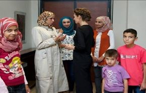 تصاویر دیدار اسماء اسد با خانواده زنان شهید سوریه