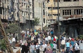 الجيش السوري يؤمن حمص والاهالي يتفقدون ممتلكاتهم +فيديو