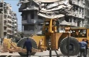 بالفيديو؛ البدء بإعادة فتح الطرقات وترميم بنى حمص القديمة التحتية