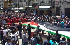 إحياء النكبة في الأراضي الفلسطينية يمتزج بإضراب الأسرى+صور