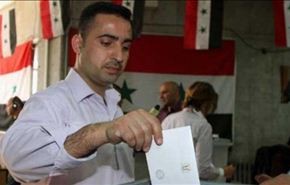 بالصور: ناخبو سوريا يواصلون الاقتراع وسط اقبال كثيف