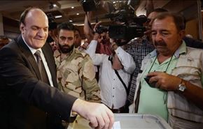 لحظه رأی دادن رقیب بشار اسد