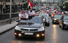 شاهد بالصور احتفالات السوريين بعرس الانتخابات