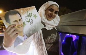 فوز الأسد بالرئاسة واحتفالات تعم المدن السورية