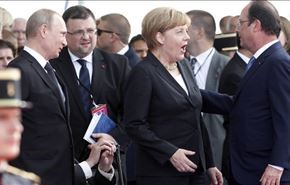 بوتين يناقش مع ميركل وهولاند الوضع في أوكرانيا
