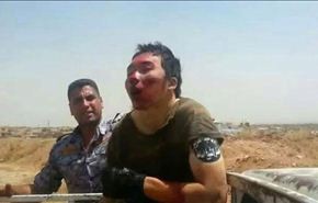 بالصور// داعشي صيني بيد القوات العراقية!