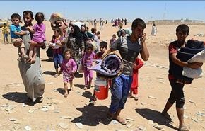 نزوح نحو 1500 تركماني إلى الحدود التركية السورية