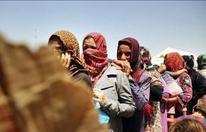 عشرات النساء العراقيات ينظمن تظاهرة للتنديد بانتهاكات 