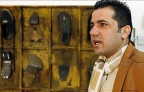 وجوه داعش على احذية فنان عراقي