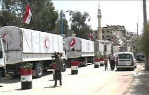 الحكومة السورية ومنظمات يقدمون مساعدات لاهالي مخيم اليرموك