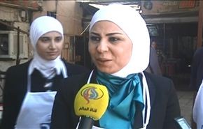 فيديو: وزيرة سورية ترتدي صدرية الطبخ ضمن مبادرة 