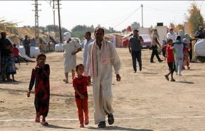 بالصور.. نازحو الأنبار يواجهون ظروفهم بأمل العودة لمنازلهم