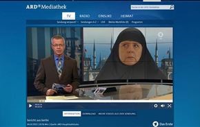 جدل حول صورة ميركل بالحجاب على التلفزيون الألماني