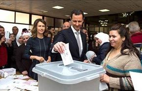 بشار اسد و همسرش در کنار صندوق رأی +عکس