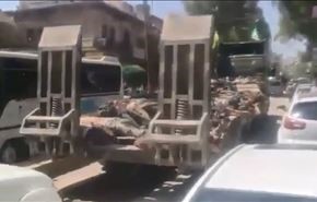 بالفيديو؛ حاملة دبابات تجوب شوارع عفرين بجثث مسلحين