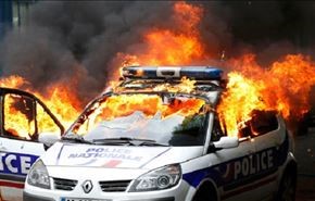 إحراق سيارة شرطة فى تجدد الإشتباكات مع المحتجين بفرنسا