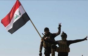 القوات الامنية ترفع العلم العراقي على جسر الصقلاوية