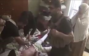 بالفيديو.. مقاتلون عراقيون يسعفون طفلاً أحرقه 