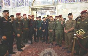 بالصور/ضباط عراقيون يؤدون قسم الولاء عند مرقد الامام الحسين (ع)