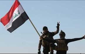 رفع العلم العراقي فوق المباني المركزية لناحية حمام العليل