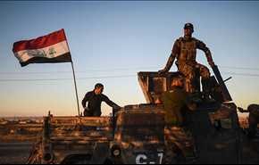 اهتزاز پرچم عراق در منطقه‌ای دیگر  در موصل