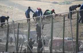 اكثر من الف مهاجر يحاولون اقتحام السياج بين المغرب وسبتة الاسبانية