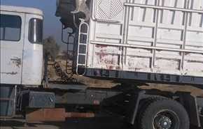 بالصور ..قوات الحشد الشعبي العراقي تضبط شاحنة على طريق الفلوجة تحمل سكر وأرز فوجد أنها تحمل 