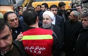 الرئيس روحاني يتفقد مكان حادثة مبنى 