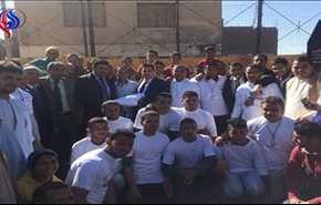 بالصور: 40 شابا مصريا بالمنيا يقدمون أكفانهم كمبادرة لمواجهة ظاهرة الثأر