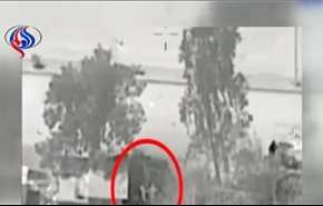بالفيديو: مسلح يحتمي بطفل والقوات العراقية توقف اطلاق النار عليه