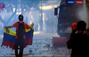 صدامات بين الشرطة ومعارضي الرئيس الفنزويلي تقابلها مسيرة لداعميه
