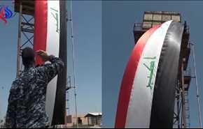 بالفيديو.. رفع أكبر علم عراقي في الجانب الأيمن من الموصل