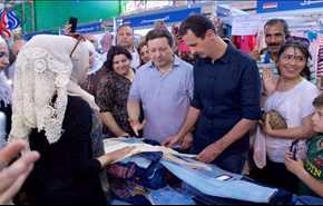 بالصور: الأسد يظهر وسط جمهوره في مهرجان للتسوّق بدمشق