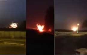 لحظة إصابة قاعدة الملك فهد بصاروخ بركان 1 واشتعال النيران فيها