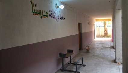 فريق من شباب الدجيل المتطوعين لترميم وتأهيل مدارس قضاء الدجيل في محافظة صلاح الدين العراقية