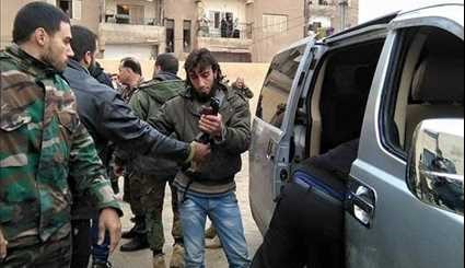 Tens of Militants Surrender to Syrian Authorities in Damascus