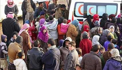 Iraqi Popular Forces Continue to Support Displaced Families of Western Mosul