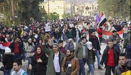 Aleppo Residents March to Celebrate Victory over Terrorism
