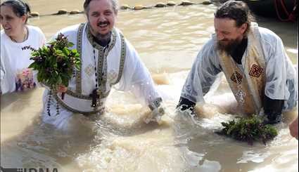Orthodox Christians baptized in Jordan River